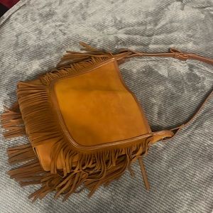 Leather fringe bag.